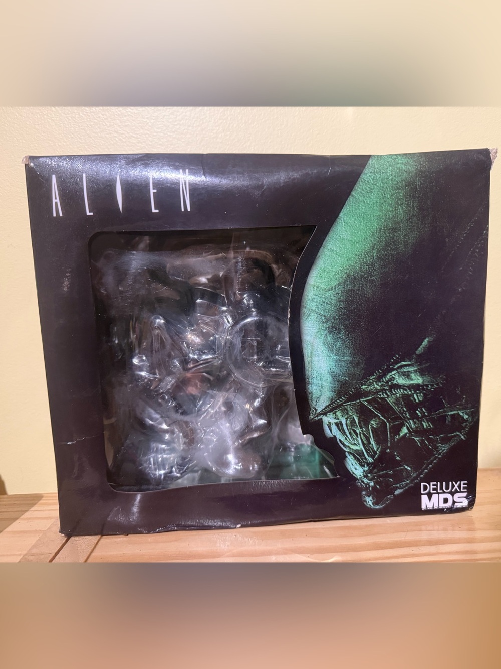 Mezco Designer Series Deluxe Alien Action Figure.